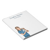 ベテリアン動物医の獣医で子犬を飼っている女性 ノートパッド (アングル)