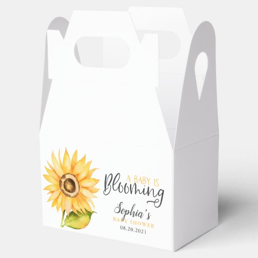 ベビーがヒマワリのシャワーを咲かせている フェイバーボックス (オープン)