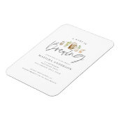 ベビーが水色のビールベビーシャワーを浴びている。 マグネット (左側)