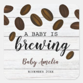 ベビーが白い木のコーヒーベビーシャワーを醸造している スクエアシール (正面)