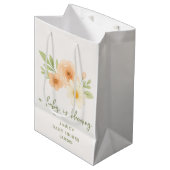 ベビーが赤ちゃんシャワーを咲かせている ミディアムペーパーバッグ (正面アングル)