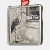 ベビーのヴィンテージを渡しているこうのとり メタルオーナメント (左)