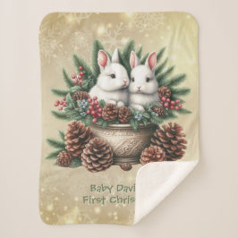 ベビーの初めてのクリスマスボウルに2つのバンニー シェルパブランケット