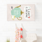 ベビーはかわいいピンクおよび緑茶のパーティーを醸造しています 横断幕 (インサイチュ)