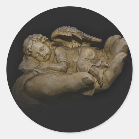 ベビーエンジェルウィングズが手で眠る ラウンドシール (正面)