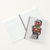 ベビーティラノサウルスのレックスが高い椅子に座っている。 ノートブック (内部)