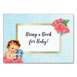 ベビーヴィンテージの女の子とバラカードの本を持って来る テーブルナンバー