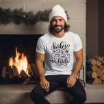 ベビー冬の外は寒い Tシャツ<br><div class="desc">冬の手書きの書道スタイルティー、雪片とのまわりにことわざ:ベビー外は寒い"。自分のために一つを得て、あなたの重要な他を得る。</div>