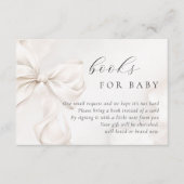 ベビー男女兼用用のバビシャワー本に弓を付ける エンクロージャーカード (正面)