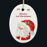 ベビー第1回クリスマスポートレート写真かわいいサンタ セラミックオーナメント<br><div class="desc">ベビー写真をアップお気に入りのロードし、独自のベビー第1回クリスマス記念オーナメントを作成。デザインは両面を持ち、あなたのパーソナライズされた文字、年と美しいサンタクロースのイラストレーションを前面に持ち、ポートレート形式で表示される背面にあなたのフルサイズの写真。</div>