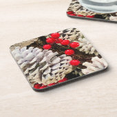 ベリーと明るく白い覆われた松のコーン コースター (左側)