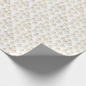 ベルが描かれたクリスマスパターン。白背景に金色 ラッピングペーパー (角)