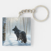 ベルギーのシェプドッグが雪のクリスマスを過ごした キーホルダー (裏面)