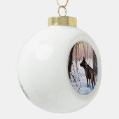 ベルギーのマリノワが雪のクリスマスを祝う セラミックボールオーナメント (左)