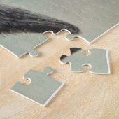 ベルギーの羊飼いの犬が黒い子猫を抱く ジグソーパズル (側面)