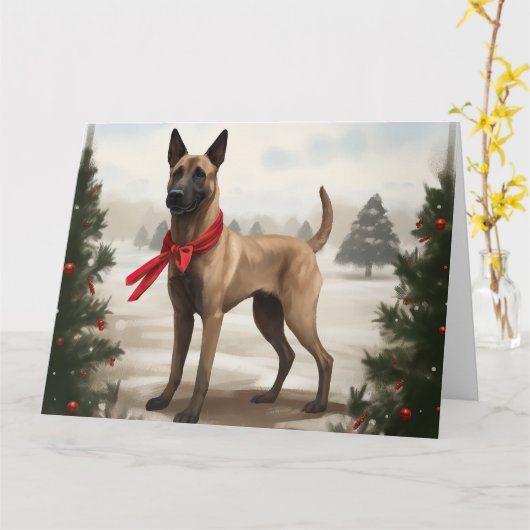 ベルジャン・マリノアの犬の雪のクリスマス カード (黄色い花)