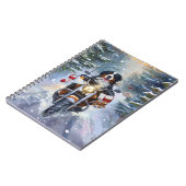 ベルネーズマウンテンドッグオートバイクリスマスに乗る ノートブック (左側)