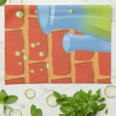 ベンチに置かれた漫画のガラス科学機器 キッチンタオル (折り畳み)