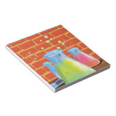 ベンチに置かれた漫画のガラス科学機器 ノートパッド (アングル)