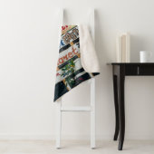 ベージュの看板に赤と茶のベージュの看板が掲げられる シェルパブランケット (インサイチュ)