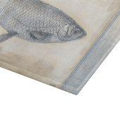 ベージュの背景に灰色の魚 カッティングボード (角)