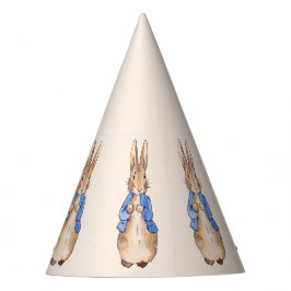 ベージュの背景を持つウサギのピーター パーティーハット