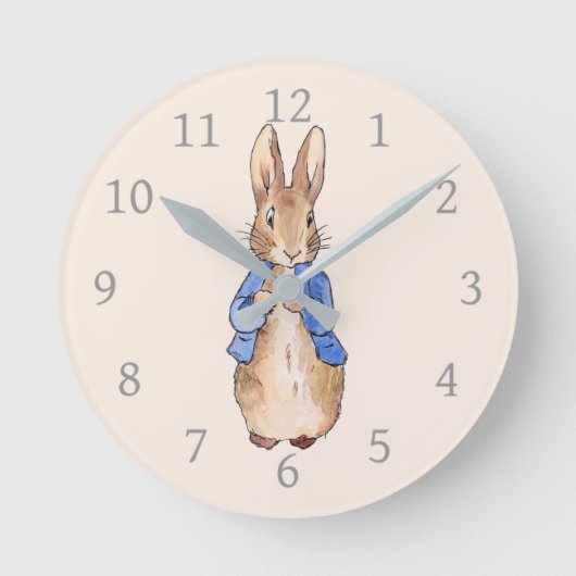 ベージュの背景を持つウサギのピーター ラウンド壁時計 (正面)