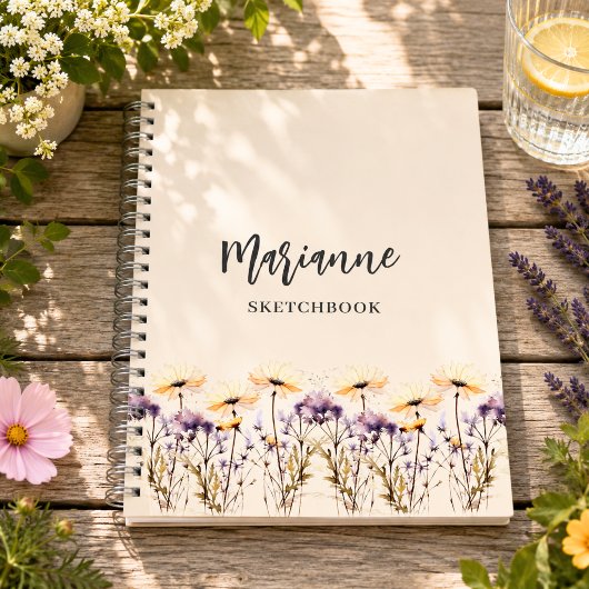 ベージュの野の花と名前の手書きスクリプト スケッチブック ノートブック