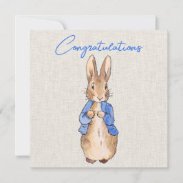 ベージュの麻布を背景にしたウサギのピーター