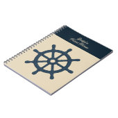 ベージュの"Coastal travel"名入りネイビーの船の舵輪 ノートブック (左側)