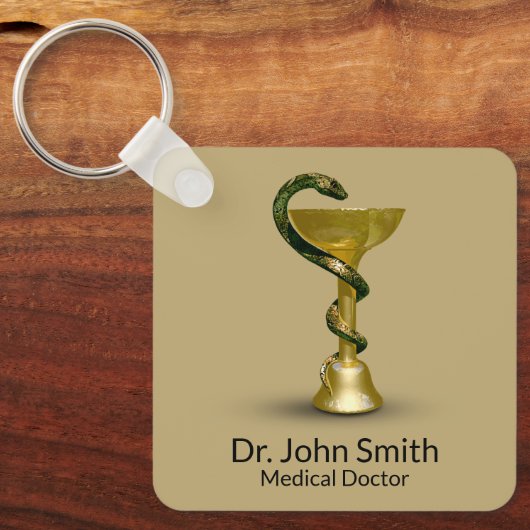 ベージュメディカルスネークボウル衛生金ゴールドカドゥセウス キーホルダー (正面)