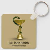 ベージュメディカルスネークボウル衛生金ゴールドカドゥセウス キーホルダー (裏面)