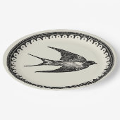 ベージュ背景の飛んでいるで旧式なつばめの鳥 ペーパープレート (アングル)