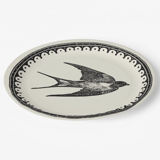 ベージュ背景の飛んでいるで旧式なつばめの鳥 ペーパープレート (アングル)