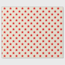 ベージュ色の明るい赤い星