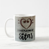 ベースクレフ、 音符記号ハートヴィンテージシートミュージックシタール コーヒーマグカップ (左)