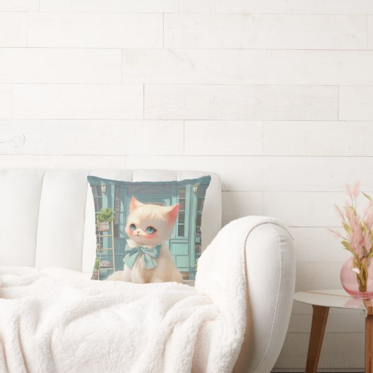 ペストリーショップでブルーボウ付きフワフワの子猫 クッション (ソファ)