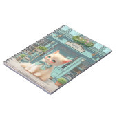 ペストリーショップでブルーボウ付きフワフワの子猫 ノートブック (左側)