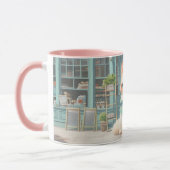 ペストリーショップでブルーボウ付きフワフワの子猫 マグカップ (左)