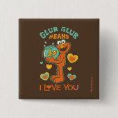 ペットの金魚を抱くエルモ 缶バッジ (正面)