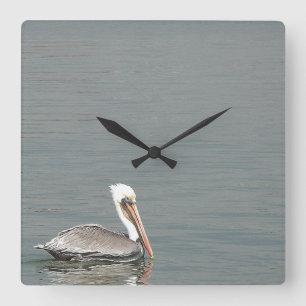 ペリカンの鳥の野性生物動物のビーチの海 スクエア壁時計