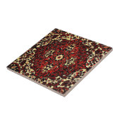 ペルシャの絨毯は濃い赤とクリーム色をしている タイル (側面)