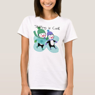 ペンギンのスケートで滑ることは涼しいです Tシャツ