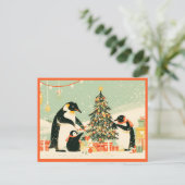ペンギンの家族でクリスマスツリーを飾るポストカード ポストカード (スタンド正面)