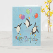 ペンギ飛んでいるン誕生日カード カード (黄色い花)