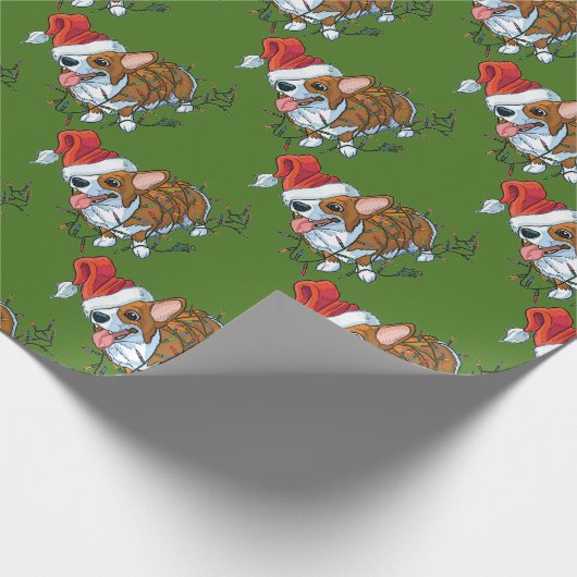 ペンブロークのウェルシュコーギーの子犬のクリスマスのクリスマスライト ラッピングペーパー (角)