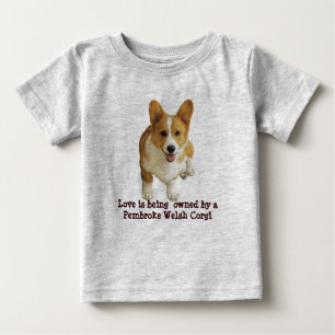 ペンブロークのウェルシュコーギーの幸せな幼児のユニセックスなTシャツ ベビーTシャツ