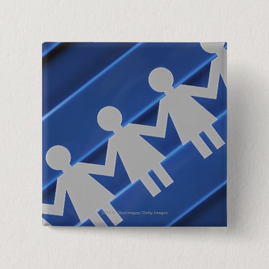 ペーパーチェーン人形のクローズアップ 缶バッジ (正面)