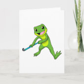 ホッケーでホッケーのスティックを持つカエル カード (正面)
