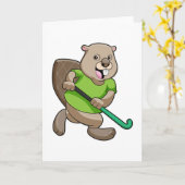 ホッケーでホッケーのスティックを持つビーバー カード (黄色い花)